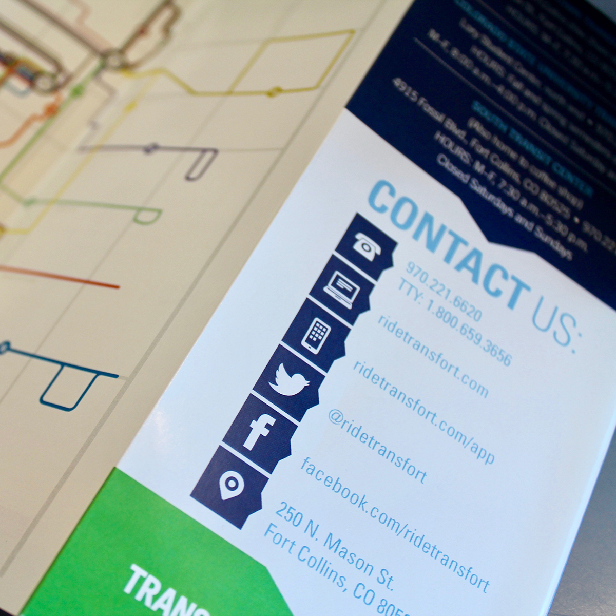 close up of a brochure that says contact us