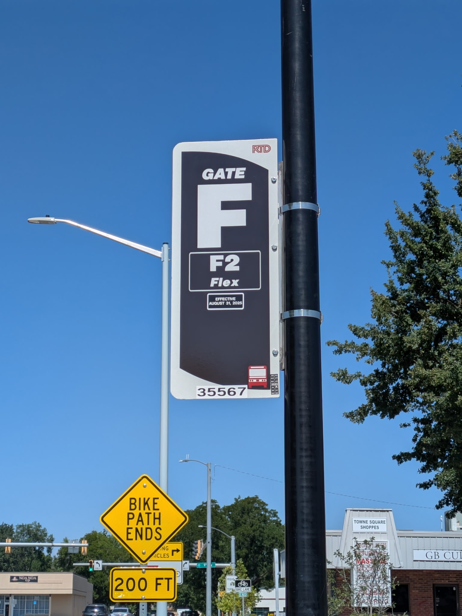 sign showing the Flex bus stop at Coffman and 8th in Longmont